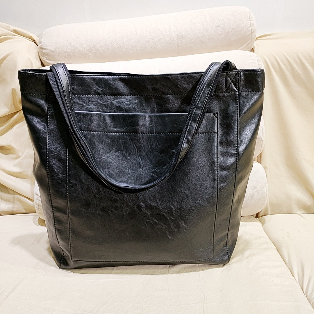 Genuine leather elegant women's handbag, a stylish and practical daily work bag with shoulder and crossbody options.