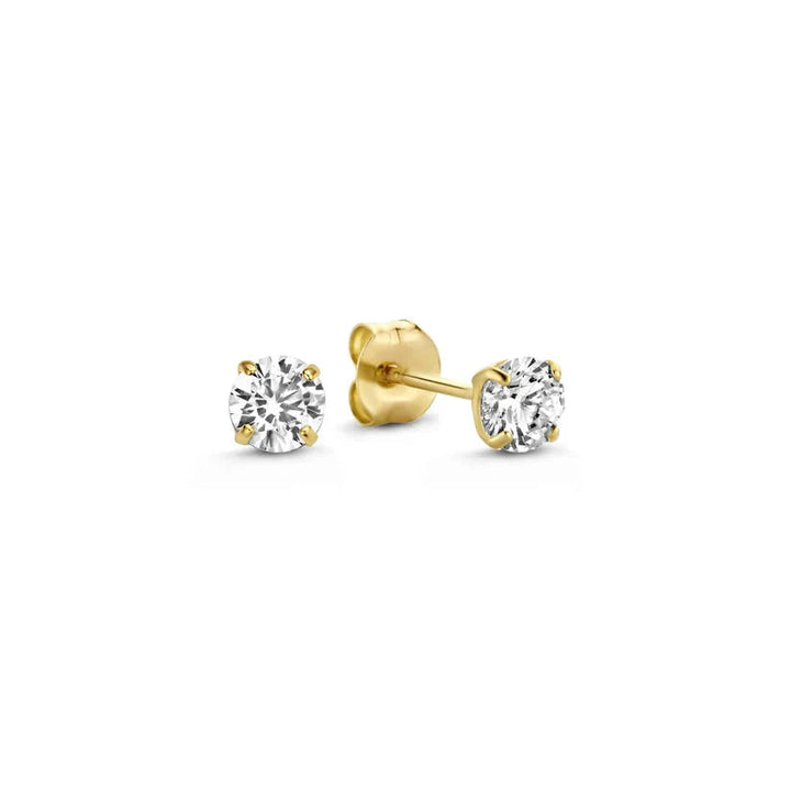 Handcrafted gold earrings for women, showcasing sparkling gemstones.