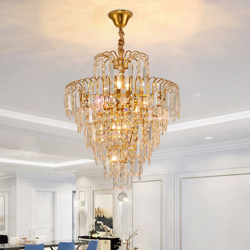Glamorous gold tiered crystal chandelier, a sophisticated and luxurious centerpiece for elegant home lighting.