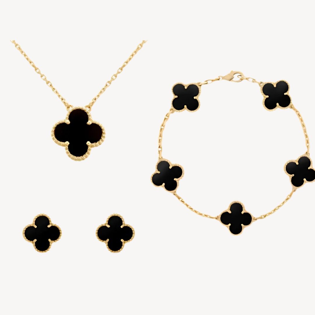 Gold-tone clover necklace, an elegant lucky charm for women. Perfect fashion accessory, available in multiple colors.