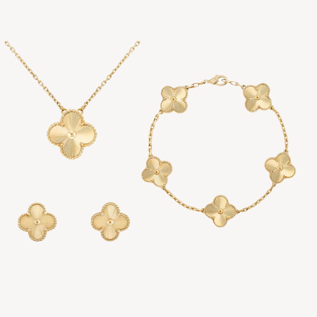 Stylish gold-tone clover bracelet for women. A delicate lucky charm, ideal for fashion-forward looks & gifting.