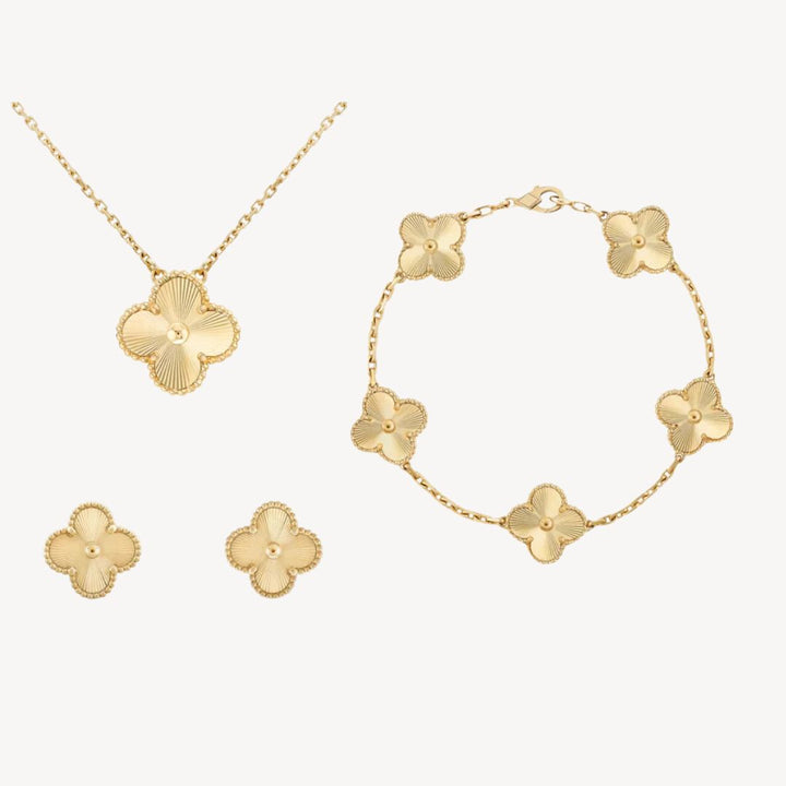 Stylish gold-tone clover bracelet for women. A delicate lucky charm, ideal for fashion-forward looks & gifting.