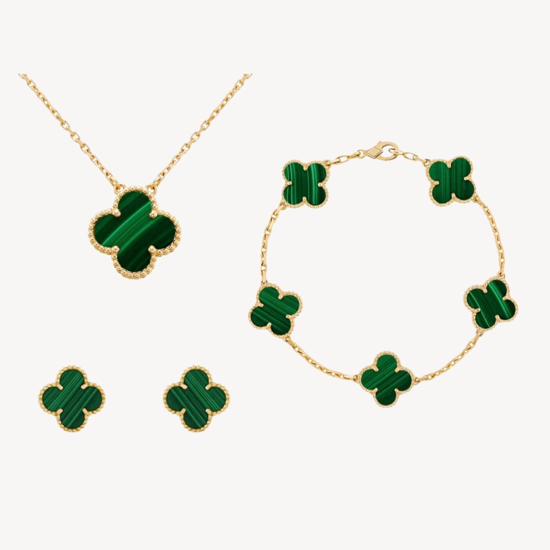 Chic gold-tone clover stud earrings for women. Elegant fashion accessories, adding a touch of luck & style.