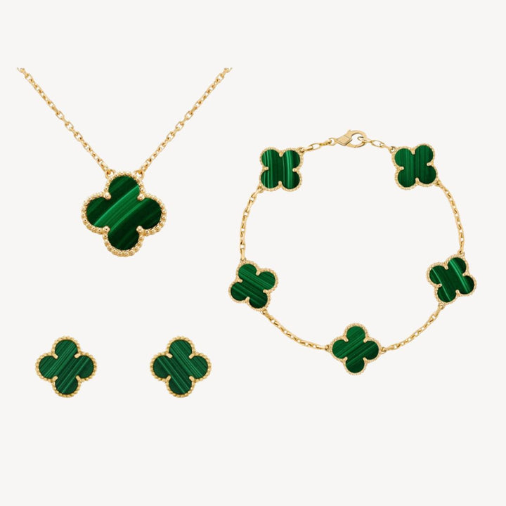 Chic gold-tone clover stud earrings for women. Elegant fashion accessories, adding a touch of luck & style.