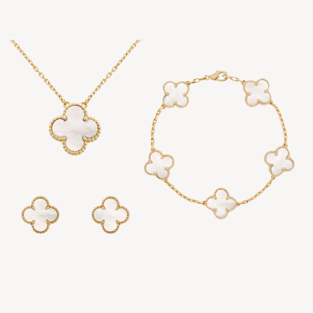 Women's gold-tone clover jewelry set featuring multi-color options: necklace, bracelet, and earrings.