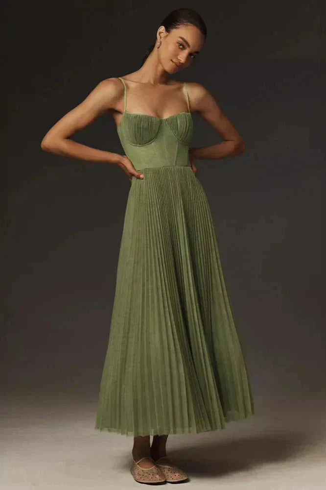 Elegant green pleated A-line midi dress for women with a chic bustier top and delicate spaghetti straps.