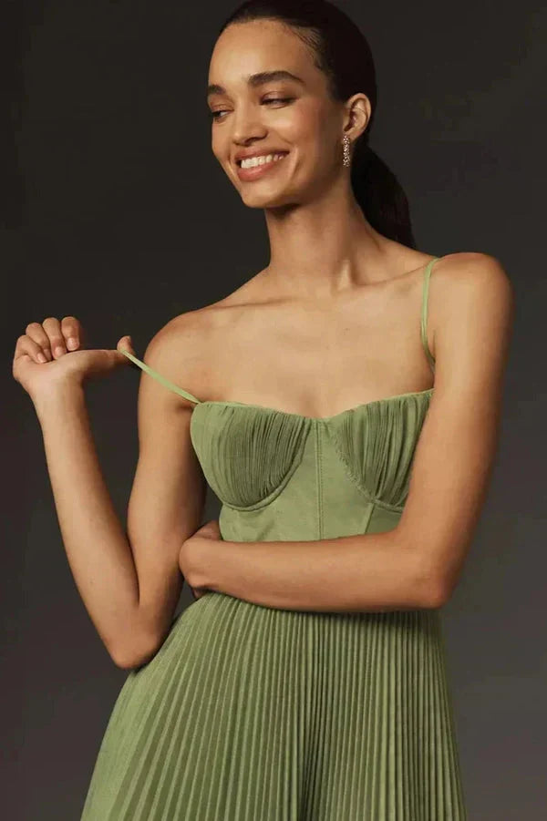 Women's green cocktail party midi dress, featuring a flattering A-line silhouette, elegant pleats, and bustier design.