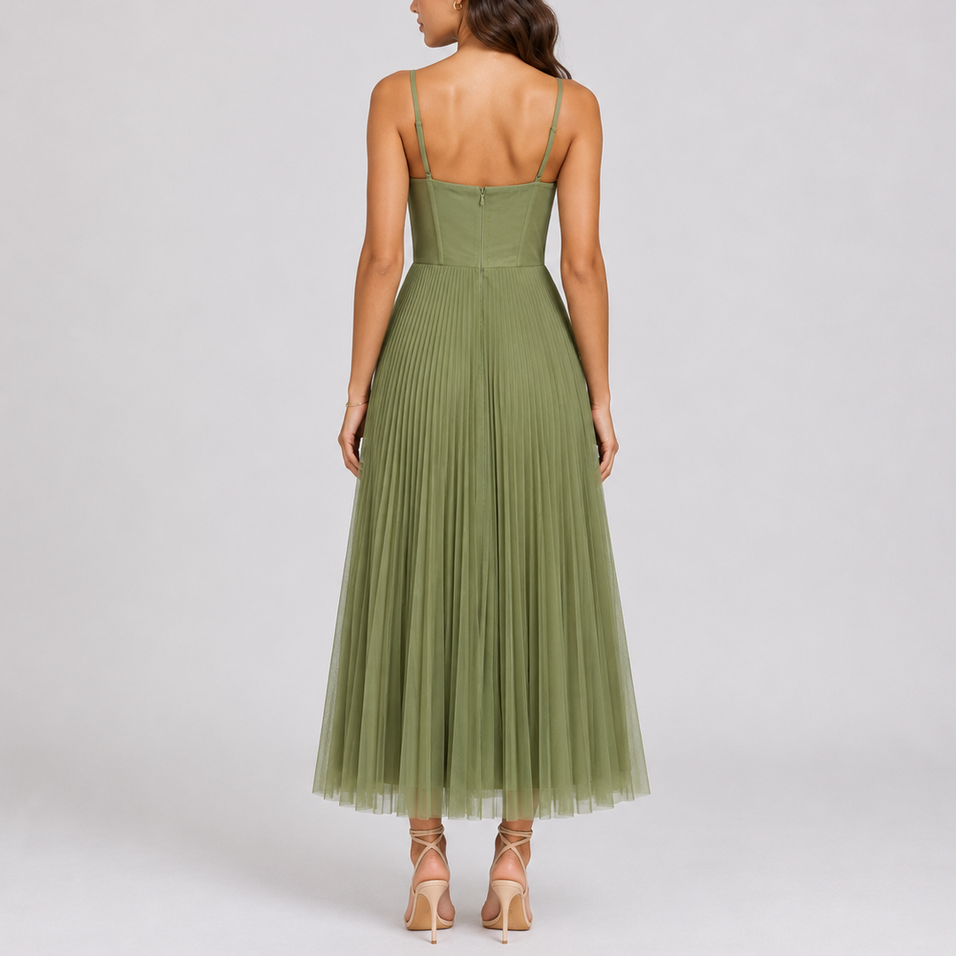 Women's graceful green pleated maxi dress, a long formal gown with elegant pleats, ideal for special occasions.