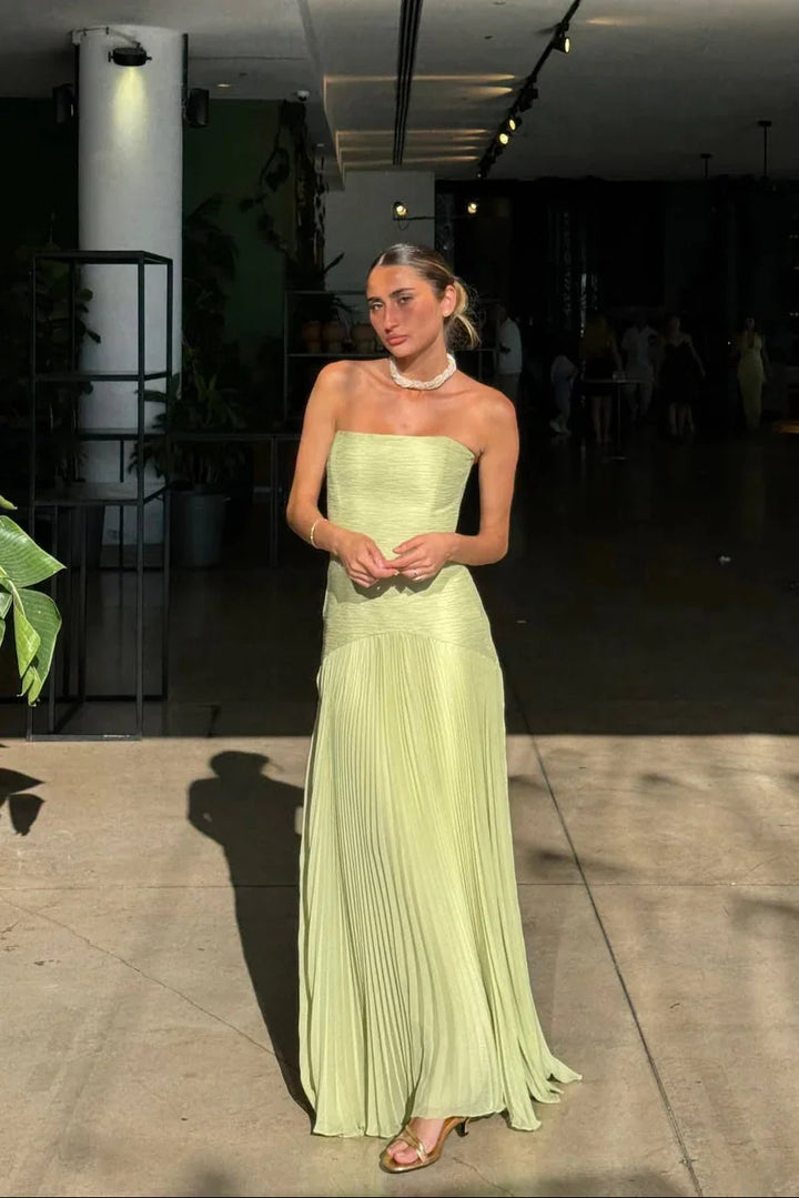 Elegant women's green strapless pleated maxi dress with a flattering silhouette for formal events.