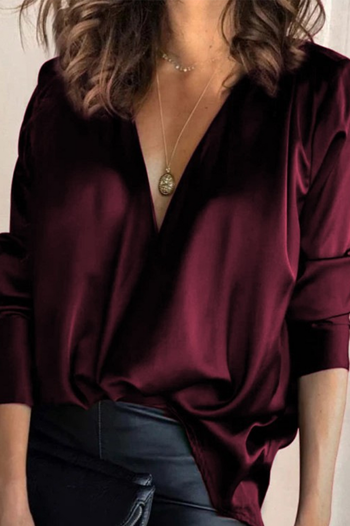 Comfortable wine red V-neck women's blouse, perfect for casual and elegant wear