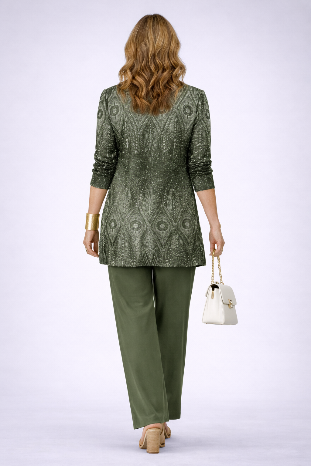 Stylish green women's 3-piece outfit: comfortable long cardigan, fitted top, and trendy wide-leg pants for a layered look.
