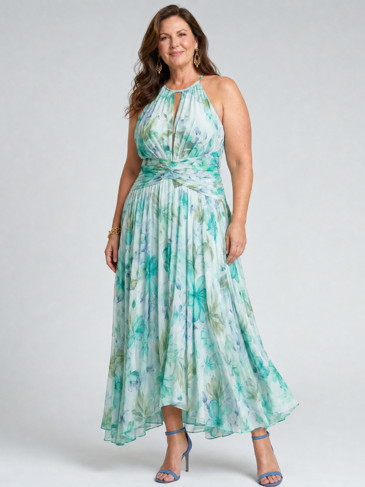 Stylish women's occasion midi dress in green, featuring a pleated floral design & elegant halter neckline.