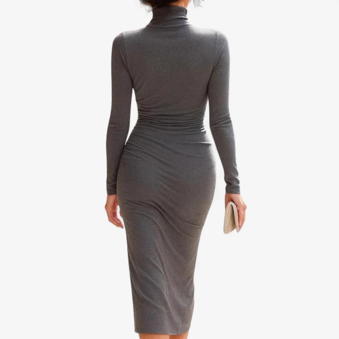Fashionable women's grey maxi dress, ruched & long-sleeved, offering a modern draped fit for any occasion.