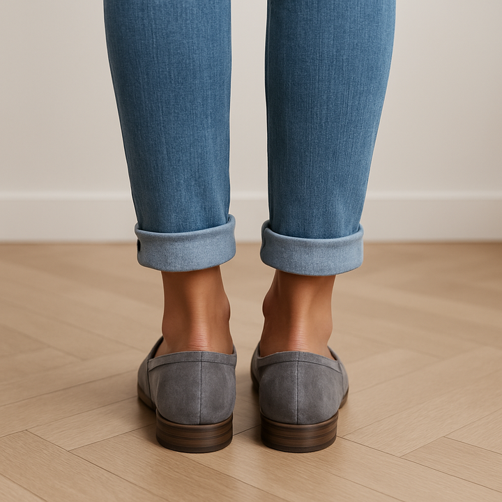 Stylish grey women's slip-on loafers. Low heel comfort, pointed toe. Perfect elegant footwear for work or daily wear.