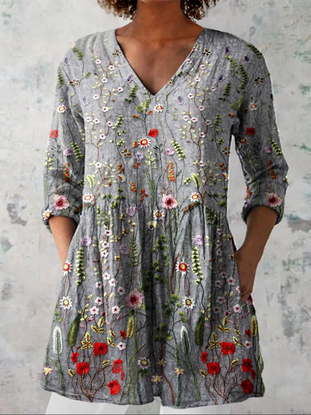 Elegant grey women's V-neck long-sleeve blouse for effortless style and comfort, perfect for casual wear.
