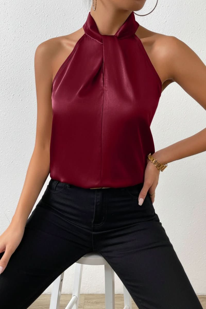 Stylish women's elegant halter top blouse, sleeveless design. Perfect for versatile evening wear or office chic.