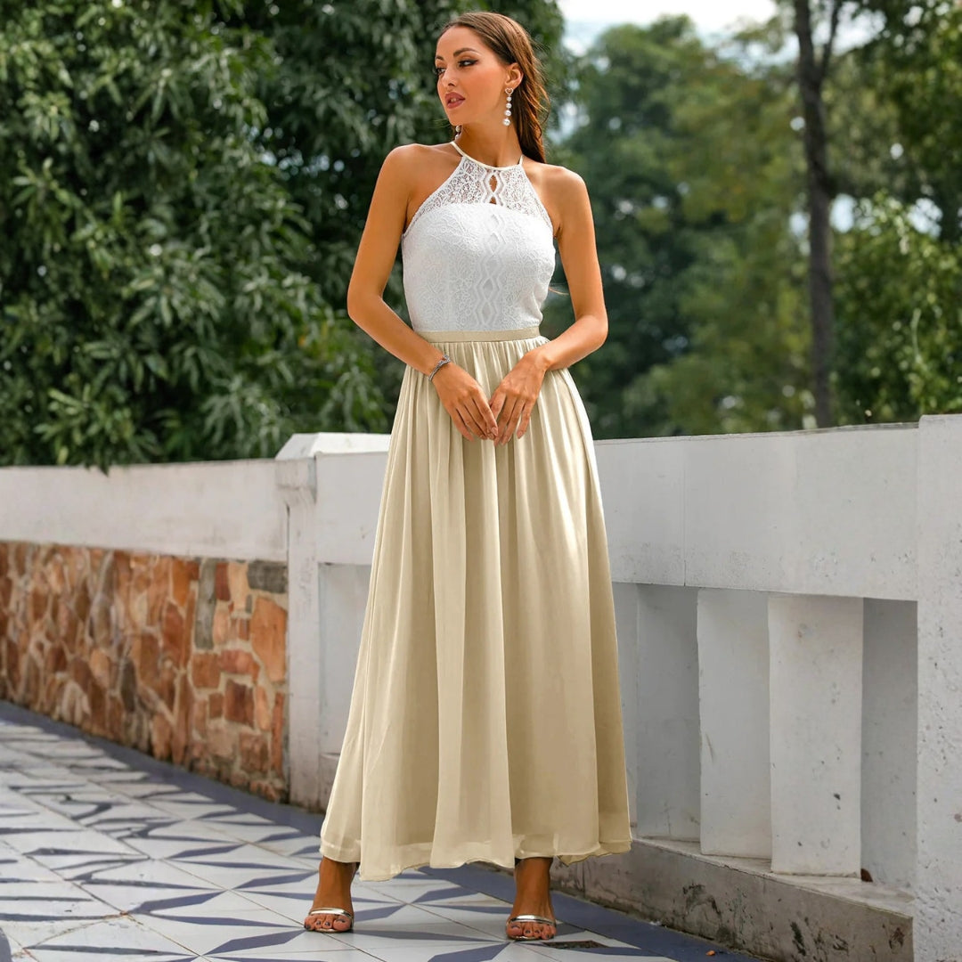 Women's long elegant halter neck maxi dress, perfect for wedding guests, special occasions, or a formal party.