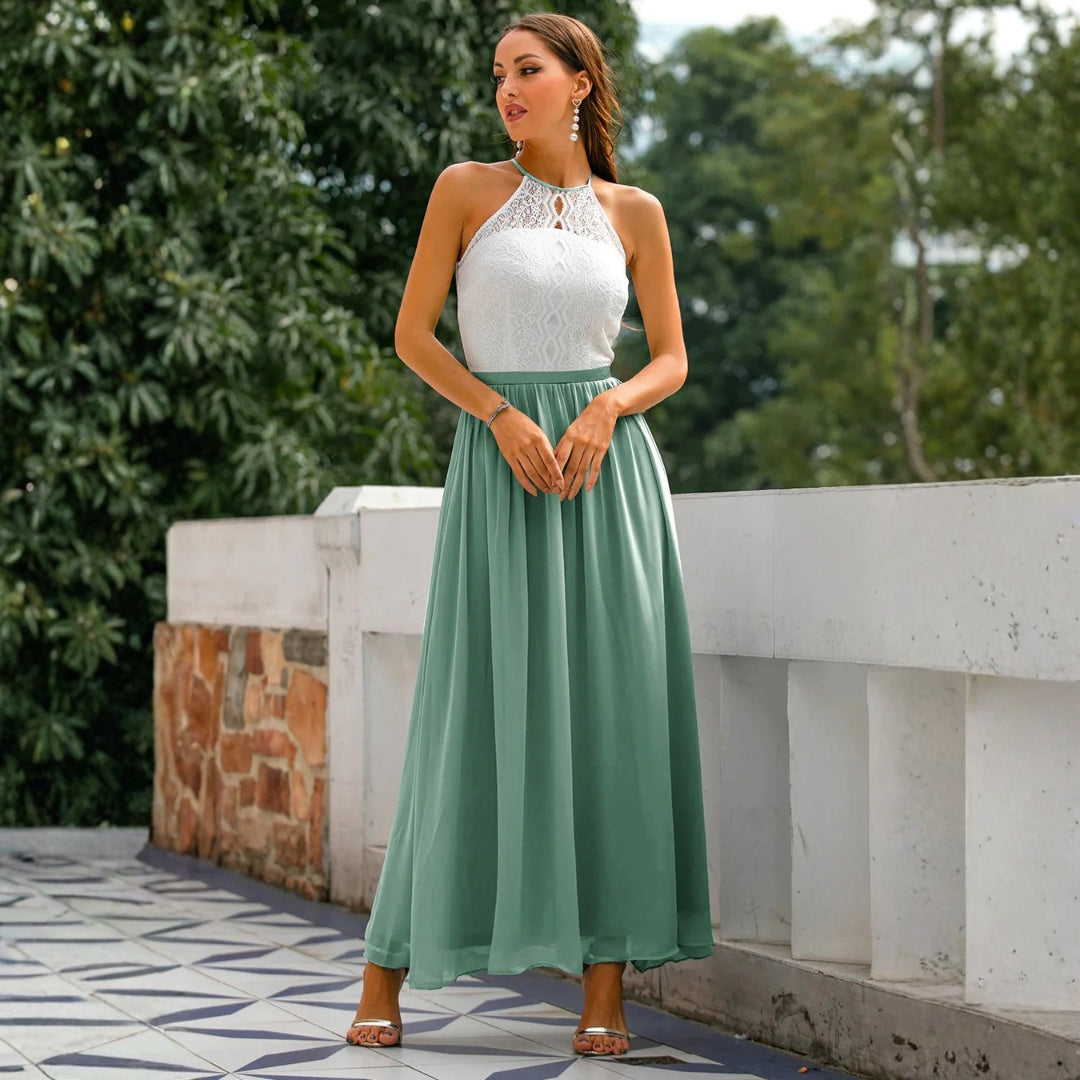 Elegant women's halter neck maxi dress, a sophisticated long gown suitable for wedding guests and formal gatherings.