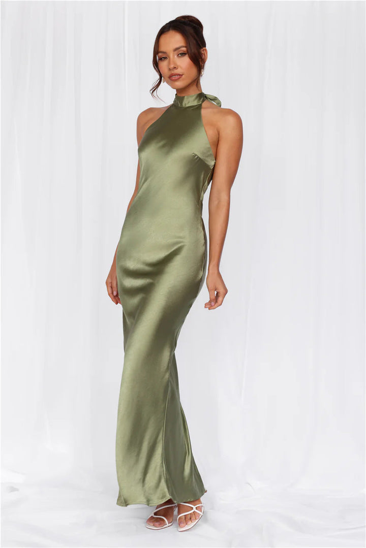 Evening wear for women: a luxurious satin maxi dress with a refined high collar.