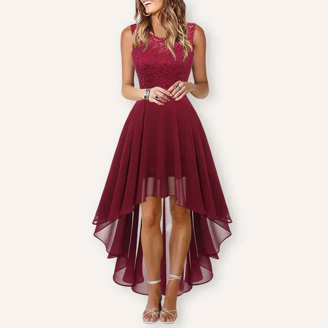 Flowing elegant high-low formal dress, a stunning wedding guest gown for sophisticated special occasions.