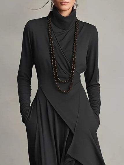 Sophisticated navy blue flowing maxi dress. Women's high neck design, an elegant long dress for any occasion.