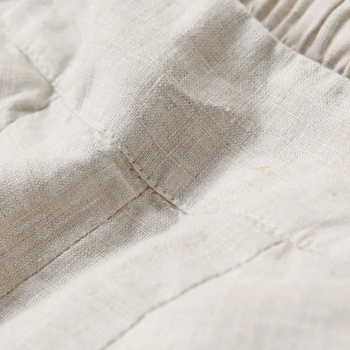 Pleated high-waist wide-leg women's trousers, a comfortable and chic addition to any wardrobe.