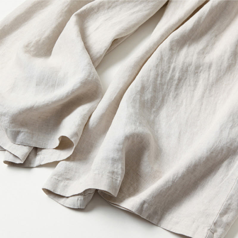 Elegant women's wide-leg pants, high-waisted with pleats for comfortable, sophisticated fashion.