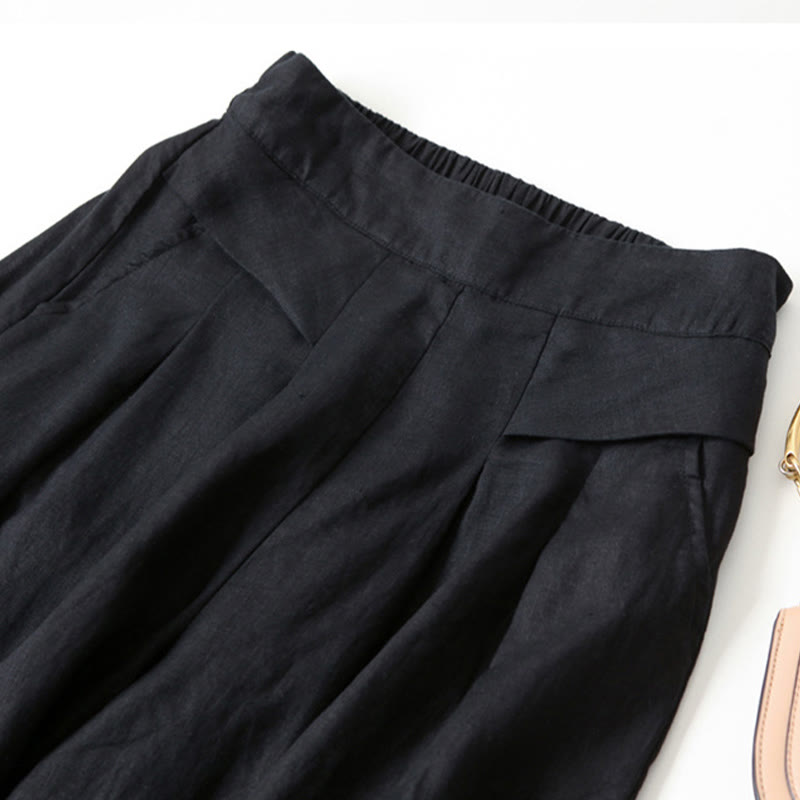 Relaxed fit women's high-waist wide-leg pants, combining comfort with contemporary style.