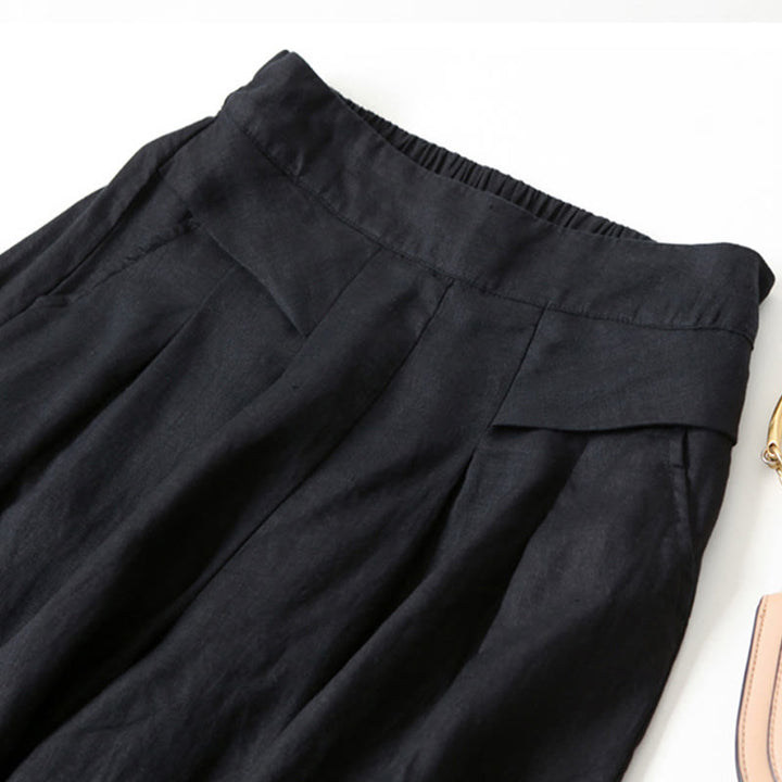 Relaxed fit women's high-waist wide-leg pants, combining comfort with contemporary style.
