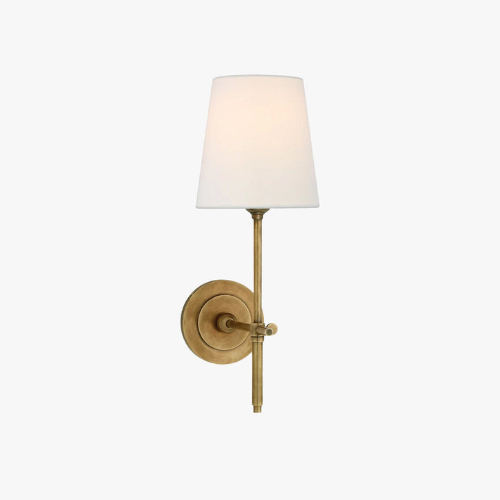 Elegant indoor wall lamp with soft fabric shade, ideal for ambient home decor lighting.