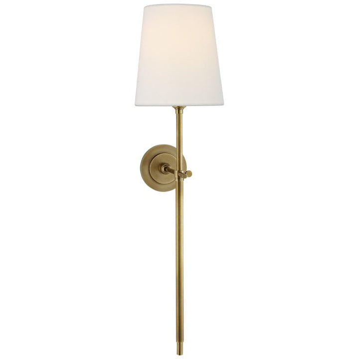 Stylish indoor wall sconce, fabric shade, metal finish, ideal for bedroom & living room.