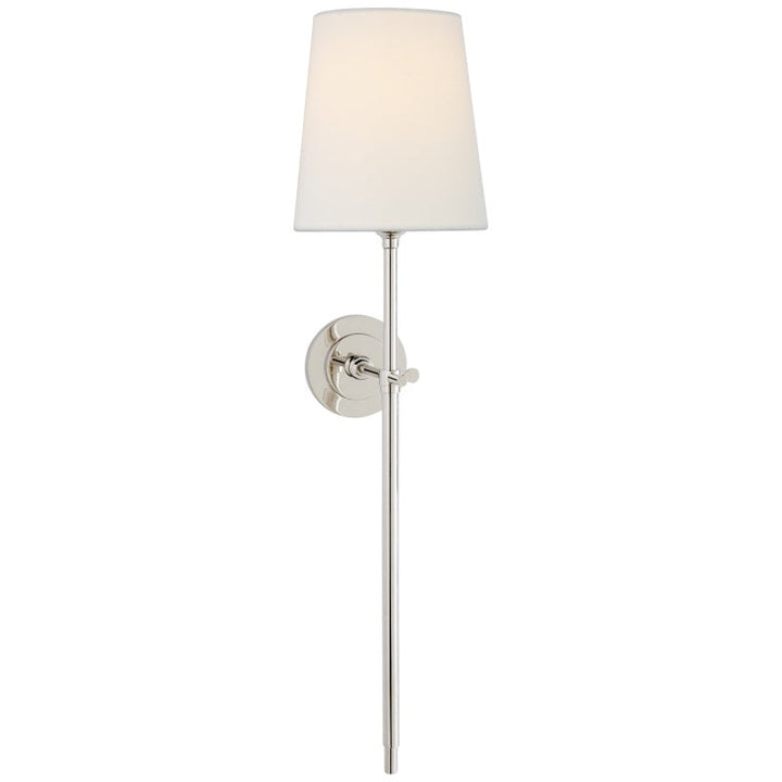 Designer indoor wall lamp, fabric shade creates a warm glow, elegant and functional.