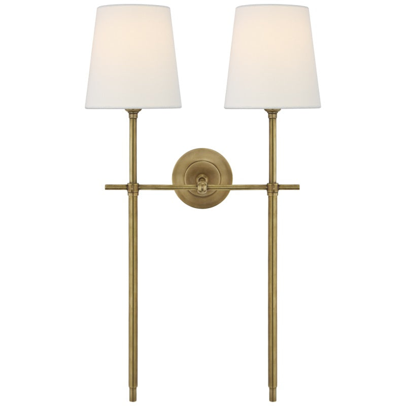 Accent wall lighting with a beautiful fabric shade, adding an elegant touch to rooms.