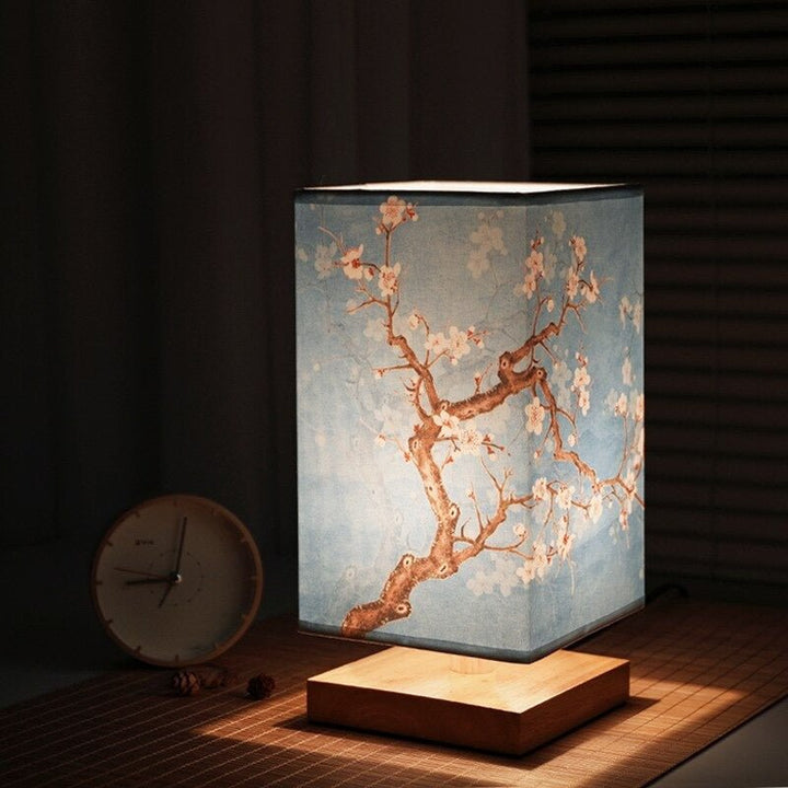 Stylish Japanese print table lamp. Scandinavian design fabric shade creates warm mood lighting for bedroom decor.