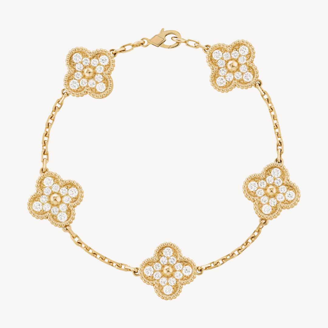 Dainty clover charm bracelet, a perfect elegant fashion accessory gift idea for ladies.