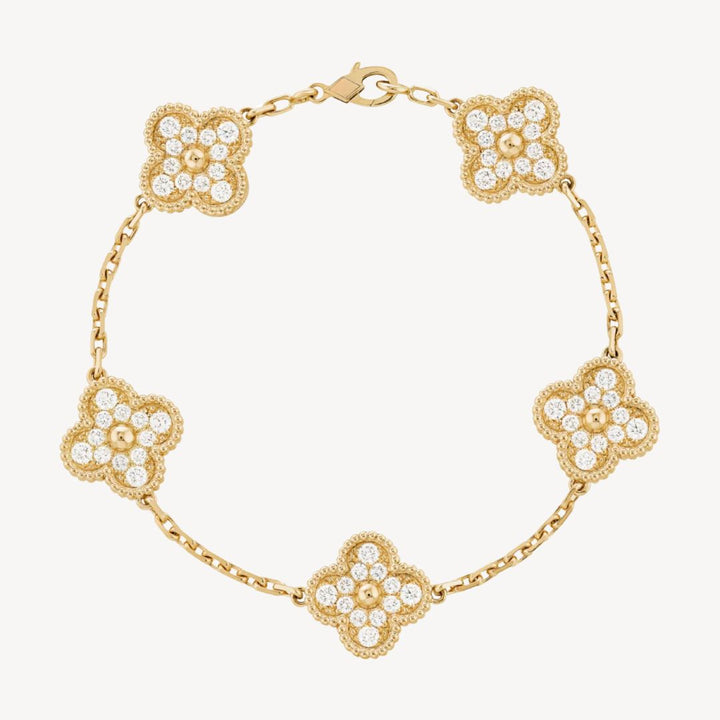 Dainty clover charm bracelet, a perfect elegant fashion accessory gift idea for ladies.