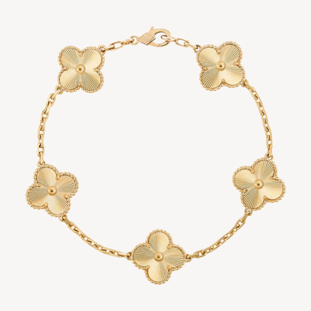 Silver tone ladies' elegant clover bracelet with charming agate stones, chic women's accessory.