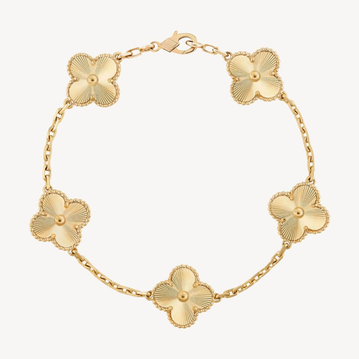 Silver tone ladies' elegant clover bracelet with charming agate stones, chic women's accessory.