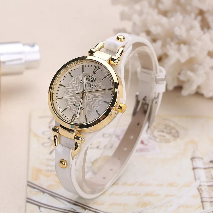 Sophisticated women's engraved dial watch with a soft vegan leather strap, perfect for everyday.