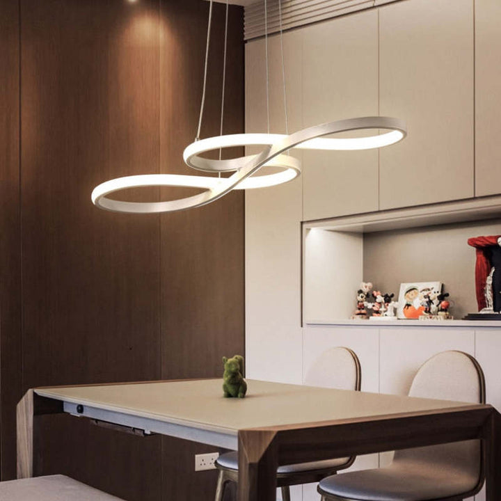 Modern LED pendant light, musical notes design providing ambient light, a stylish contemporary fixture.