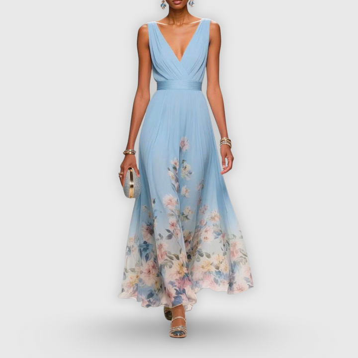 Elegant light blue women's summer midi dress, flattering design for versatile party or casual wear. Chic fashion.