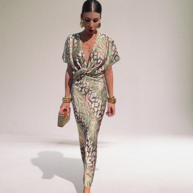 Flowy light green maxi dress for women with V-neck, an elegant choice for wedding guests & special occasions.
