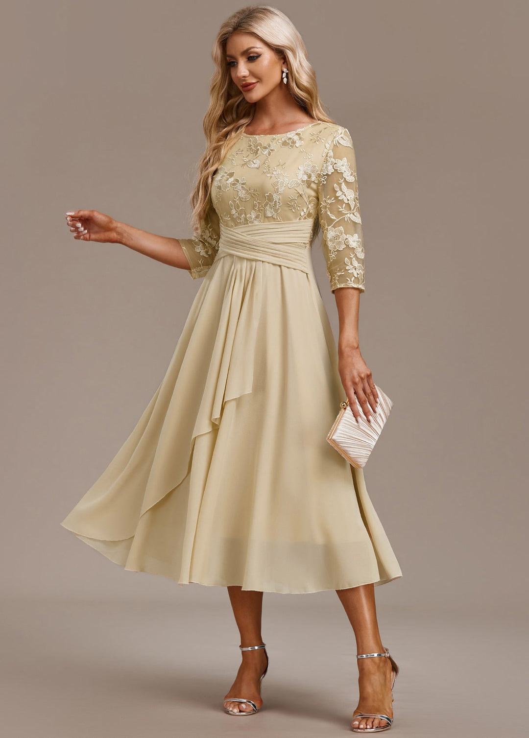 Elegant light yellow women's embroidered midi dress with round neck and 3/4 sleeves, perfect for spring occasion wear.