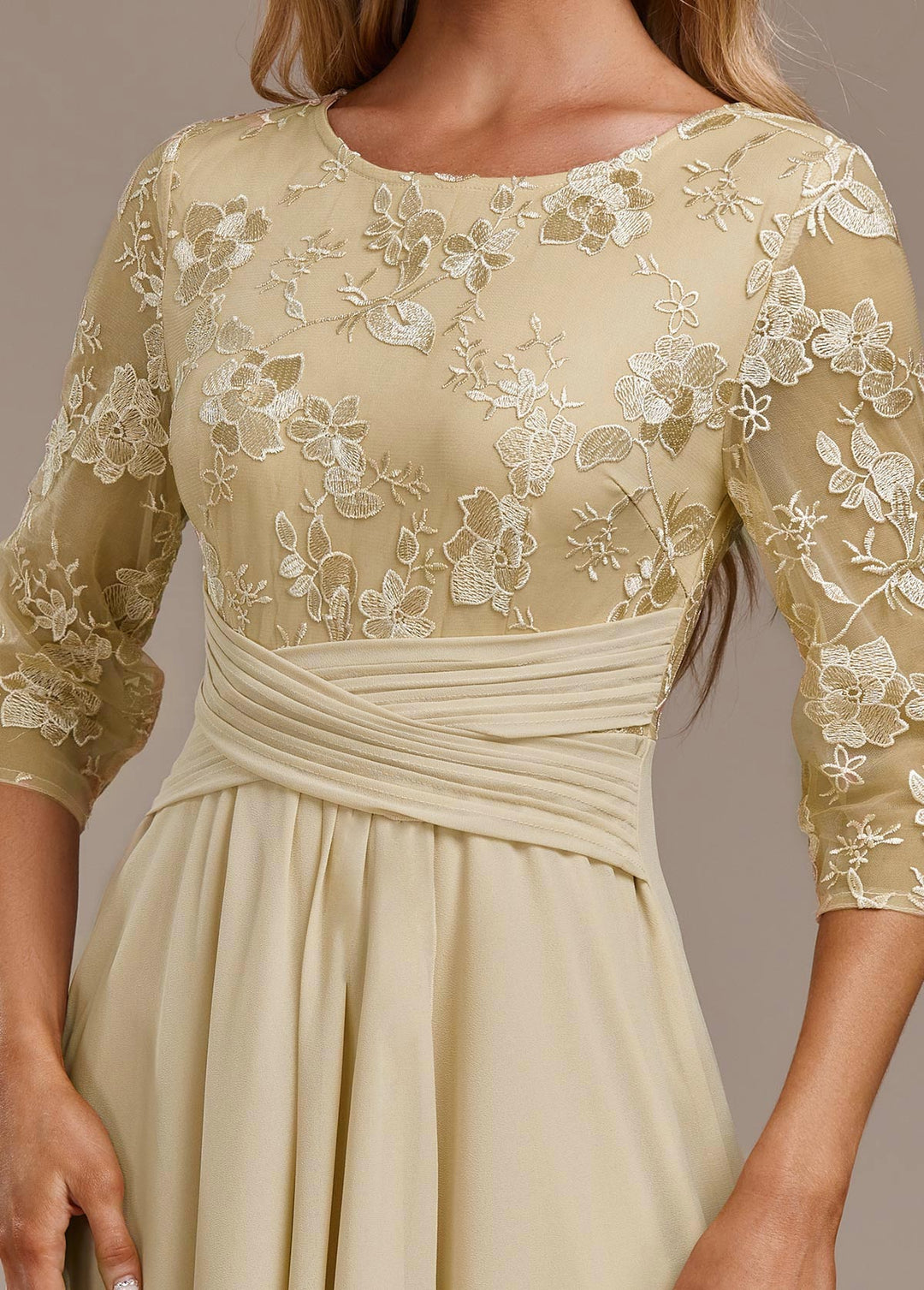 Flattering women's embroidered midi dress in light yellow, featuring an elegant round neck & 3/4 sleeves for summer.