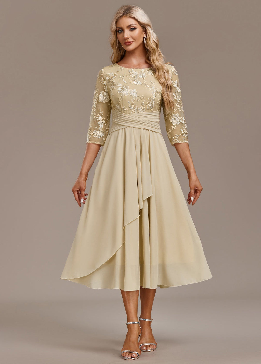 Beautifully embroidered light yellow midi dress for women, round neck, 3/4 sleeves; comfortable & stylish spring fashion.