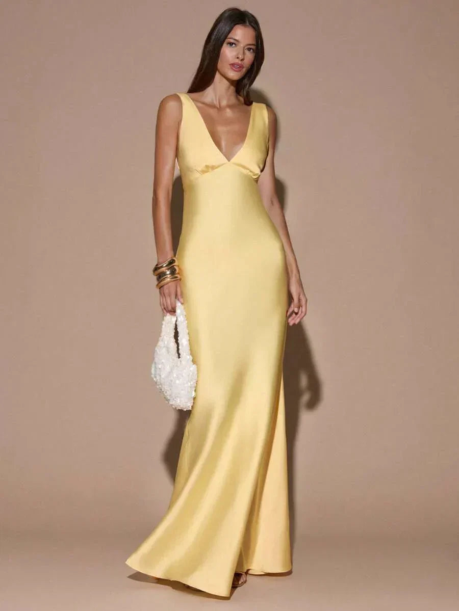 Stunning light yellow V-neck backless formal gown for women, a maxi evening dress perfect for wedding guests.