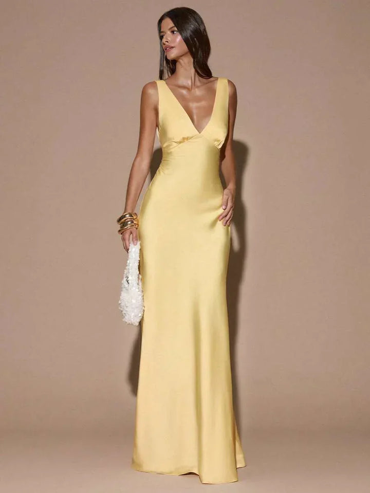 Light yellow women's V-neck backless maxi dress, an elegant formal gown for special occasions & evening parties.