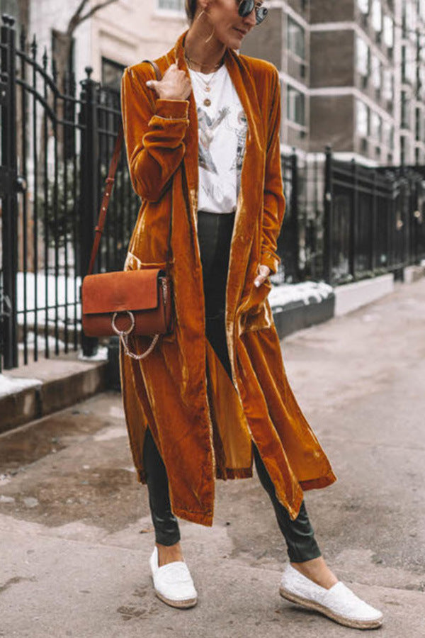 Versatile beige women's long open coat, comfortable fit for stylish autumn outerwear.