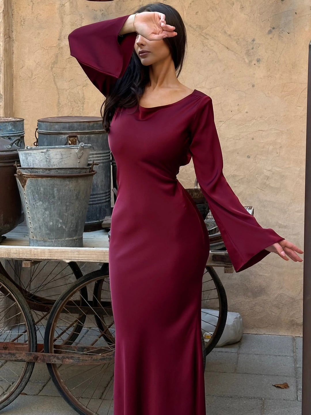 Classic black long sleeve maxi dress for elegant evening wear.