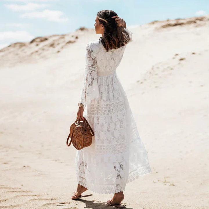 Flowy women's long-sleeve boho dress. Comfortable, relaxed fit with artistic flair. Versatile for spring & fall.